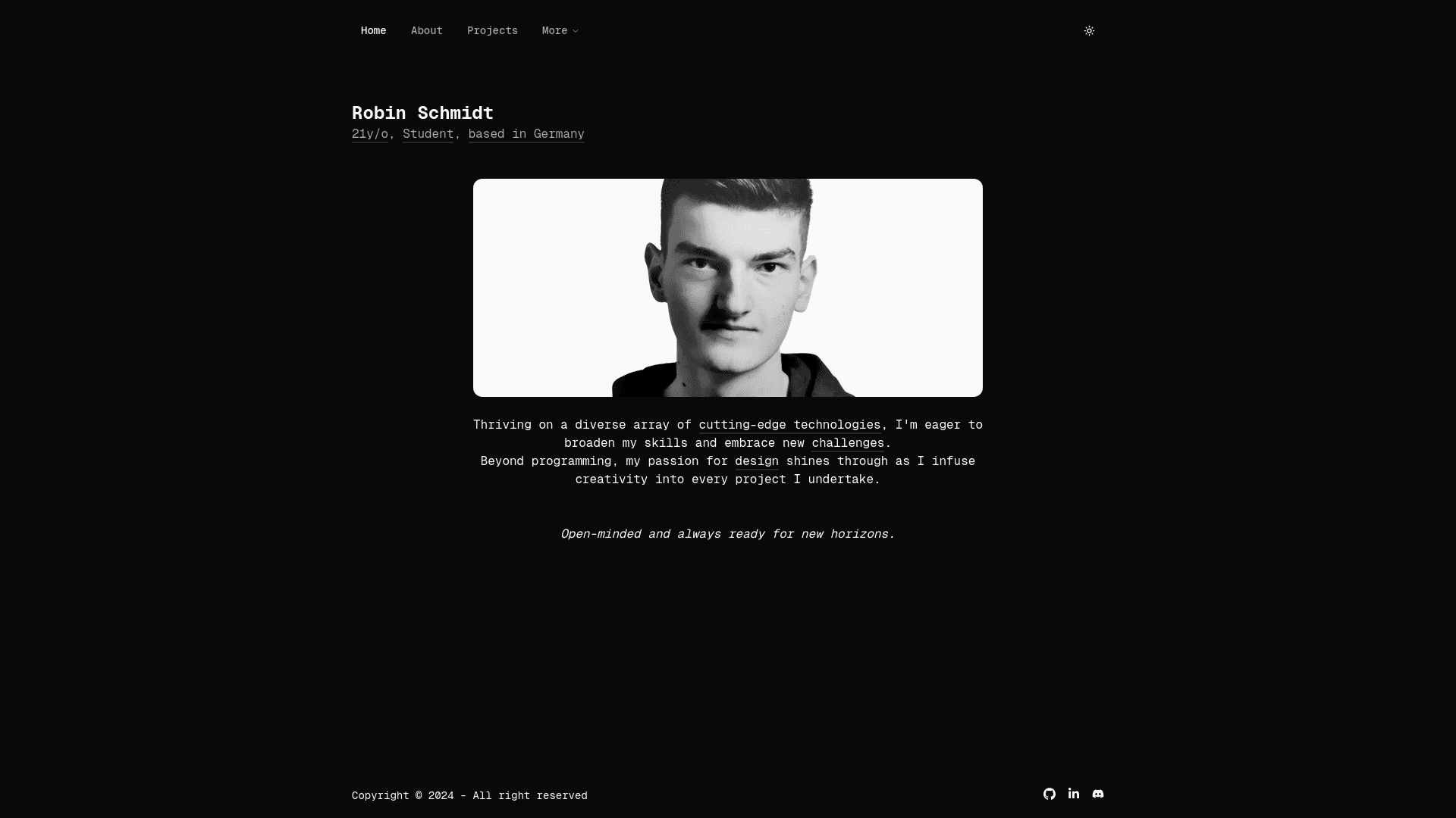 A minimal monochrome redesign with a black and white portrait